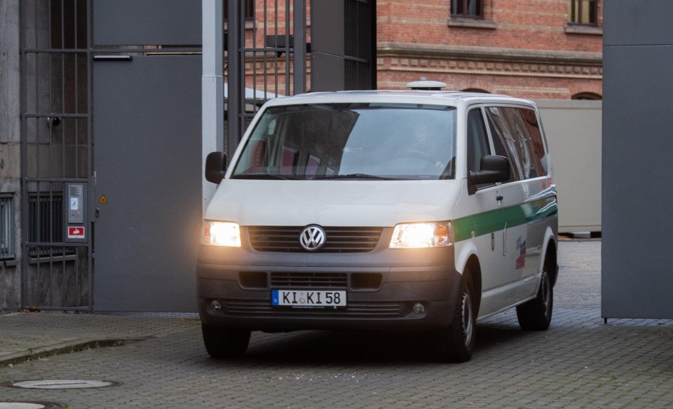 A prison van carrying Christian B arrives at Braunschweig regional court yesterday