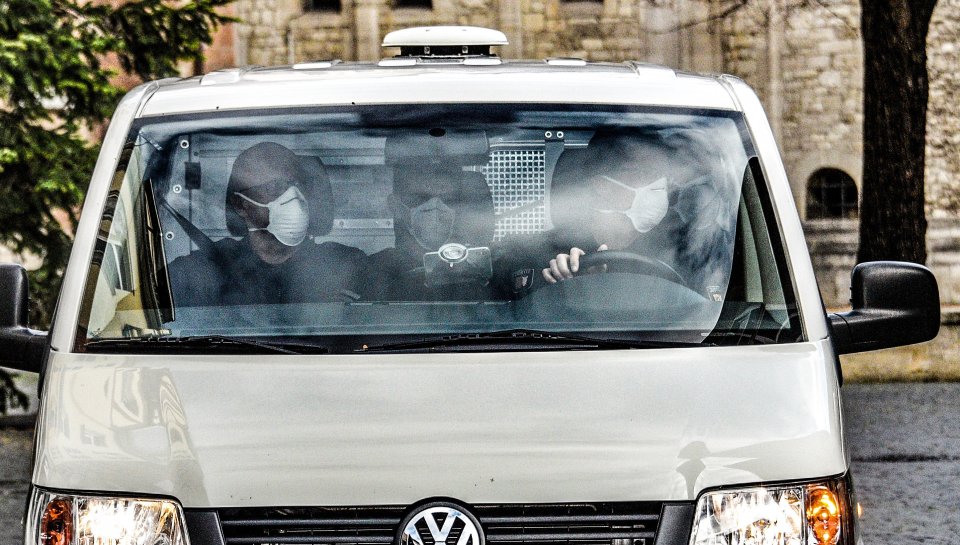 Prison officers arrive for the parole hearing in Germany