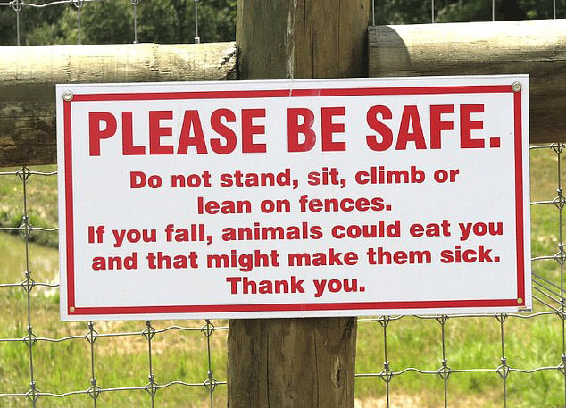 The creators of this sign definitely have their animals at heart – this cheeky sign warns they might get sick if humans fall over the fence and get eaten