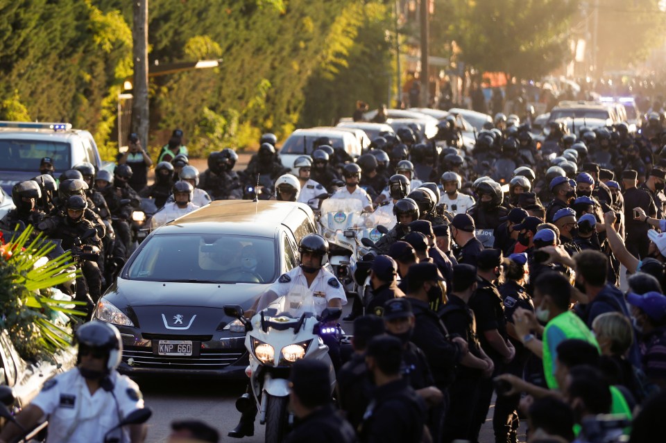 Crowds lined the street to catch a glimpse of Maradona’s hearse as head towards the cemetery