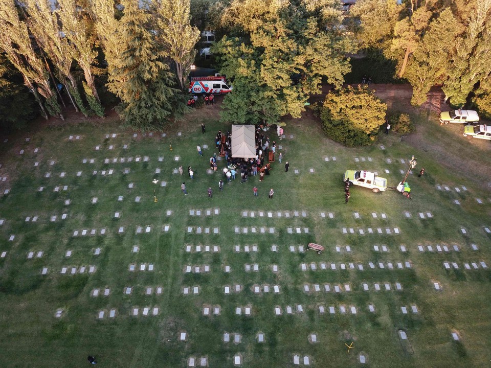 The football legend had a small, private burial and was laid to rest next to his parents