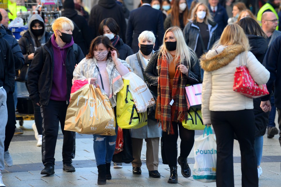  Black Friday Christmas shopping in Queen Street in Cardiff, Wales