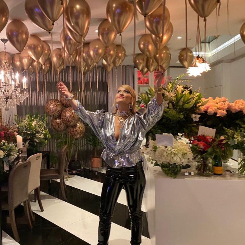 The Body On Me singer was surrounded by glam balloons and bunches of flowers on her birthday, but later had a party