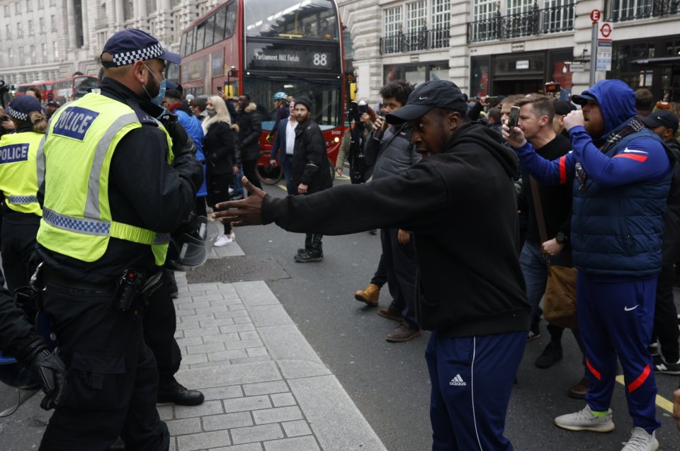 Anti-mask protesters square off with police near Regent Street