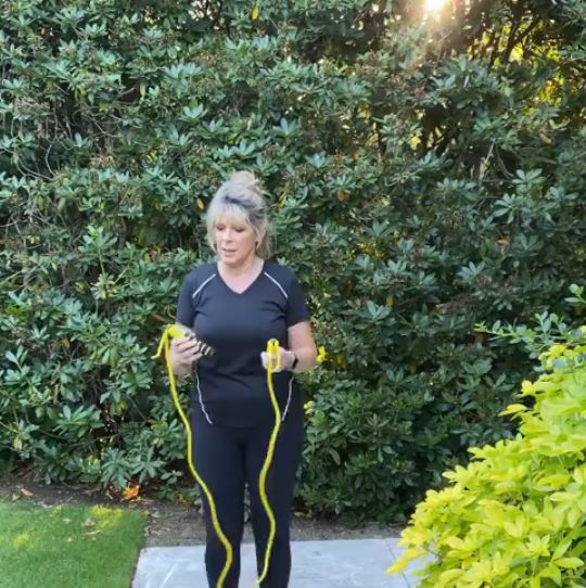 The presenter loves to workout outdoors in their garden