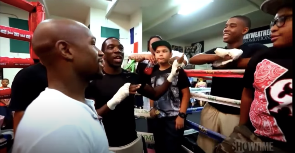 Floyd Mayweather pictured next to Donovan Cameron, and Sharif Rahman 