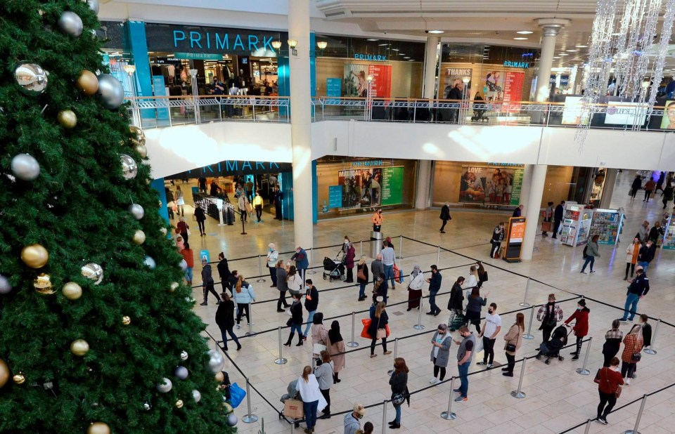 Shoppers queue in an orderly fashion outside Primark at Gateshead's Metro Centre