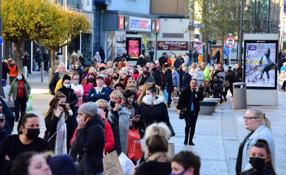 Shoppers keen to get on last trip in before lockdown queued outside a Primark in Sunderland