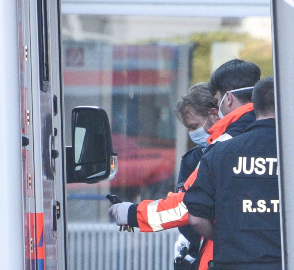 Christian B pictured entering an ambulance after leaving the ER of a hospital in Braunschweig