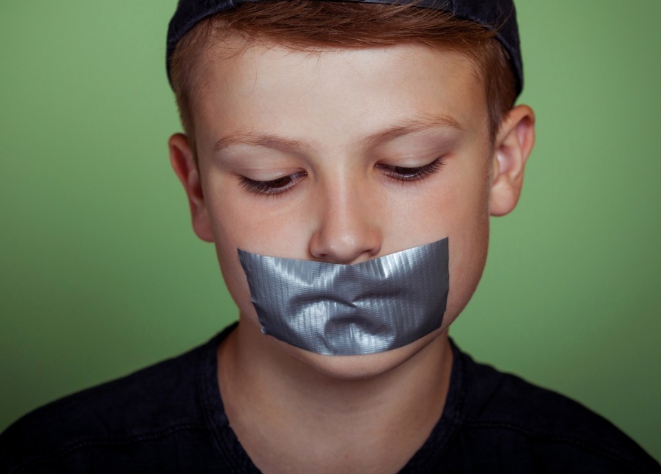 The fuming mum claims a teacher taped her son's mouth shut