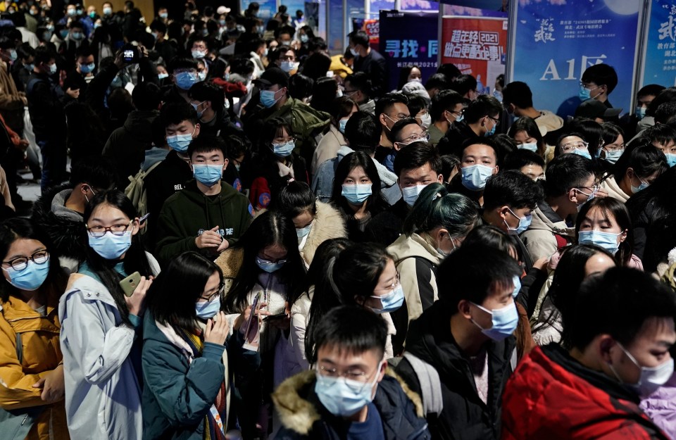 Young people attend a job fair in Wuhan yesterday