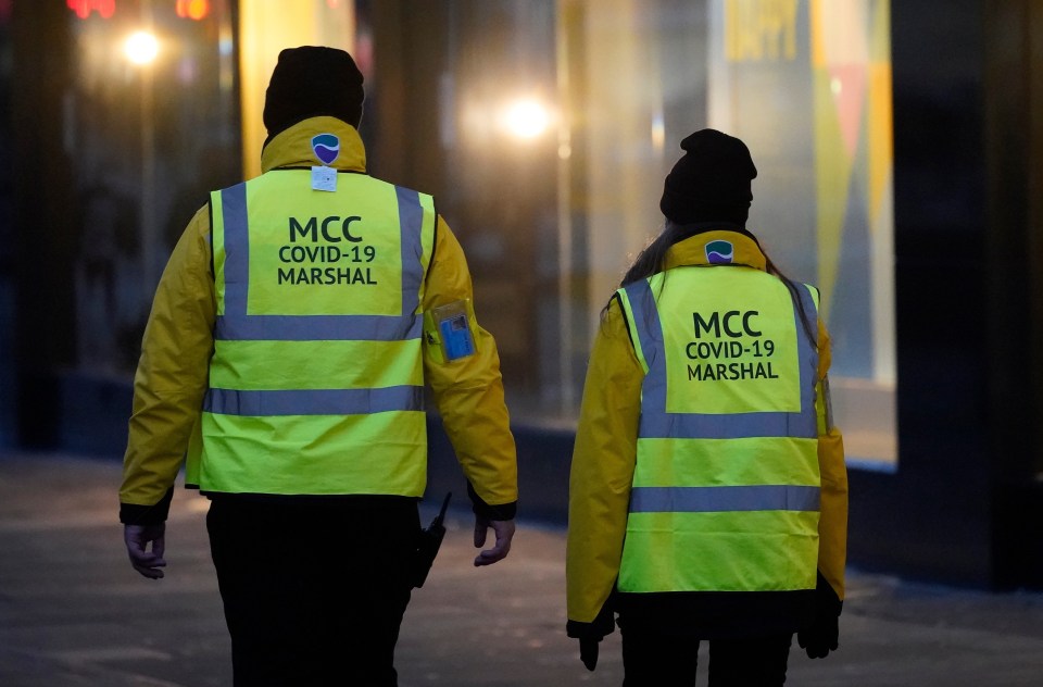 Marshalls patrol the streets of Manchester on New Year's Eve