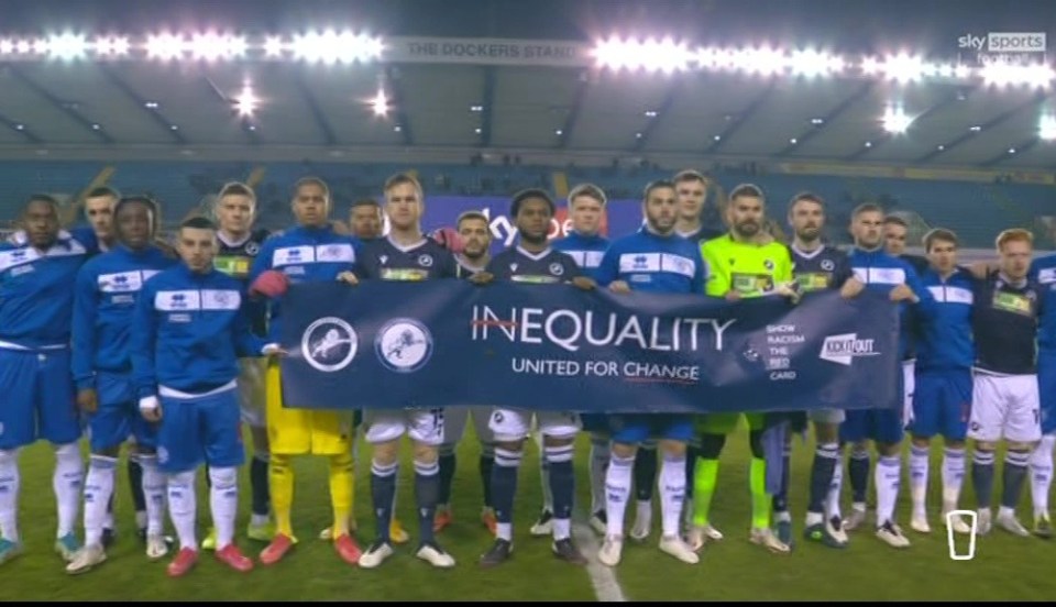 Millwall and QPR players held up a banner against racism