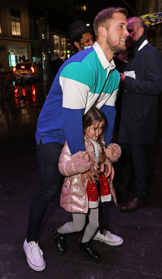 Dan and Jac's daughter Ella was dressed in a cute pink jacket to keep the cold out