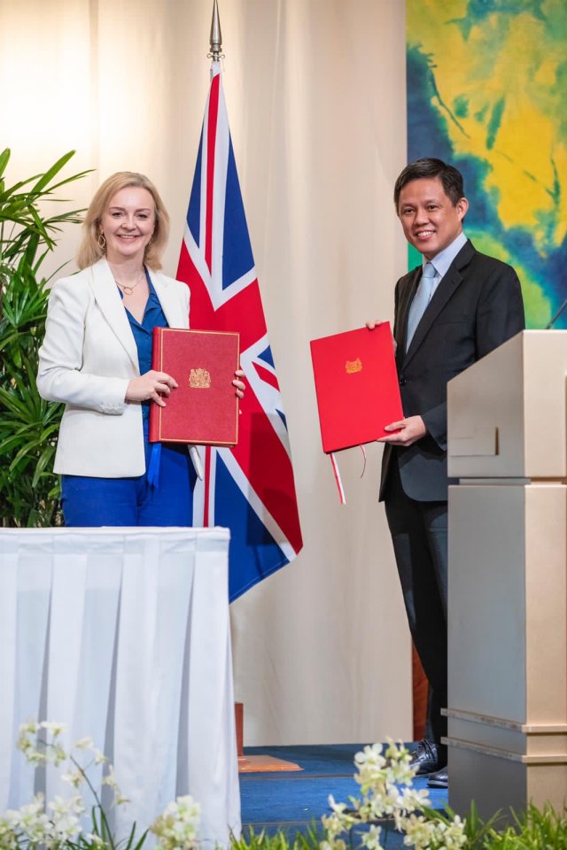 Trade Secretary Liz Truss signed a trade deal with her Singaporean counterpart Chan Chun Sing today