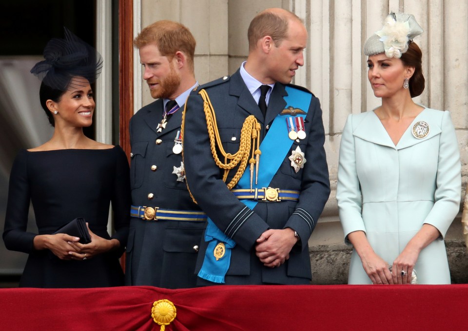 Meghan, Harry, William and Kate stand on the balcony of Buckingham Palace in 2018