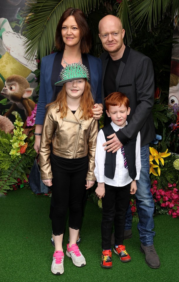 Jake pictured with his wife Alison Murray and their children