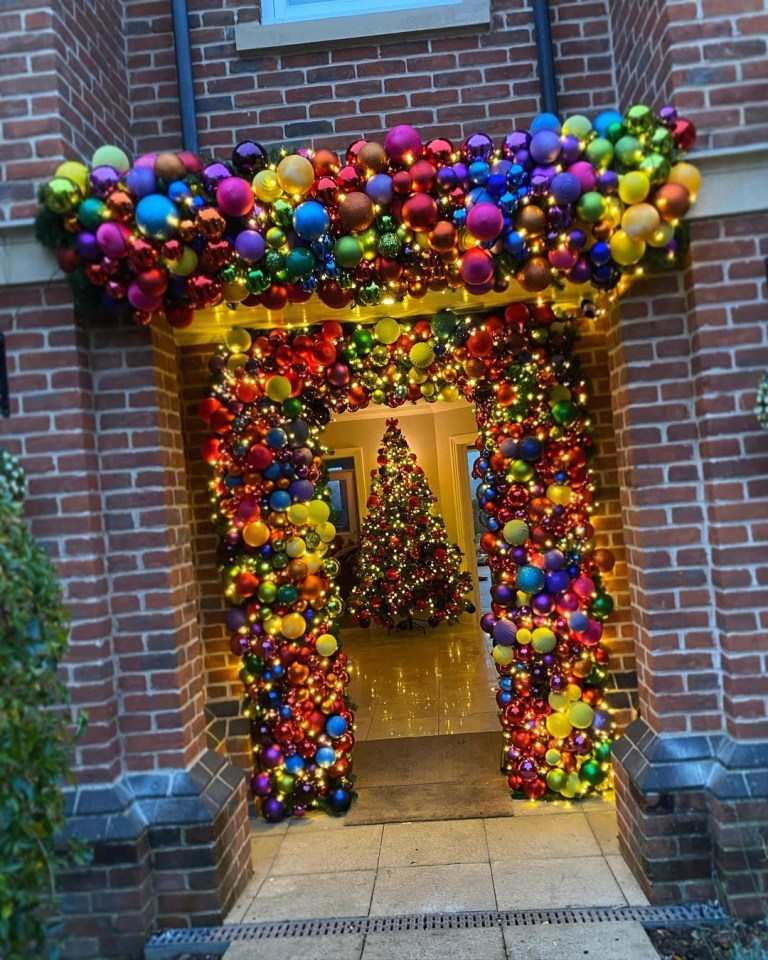 Veronika admitted that Tom's choice of front door display is ‘a riot of colour’ 