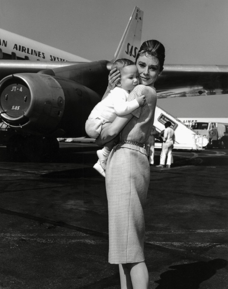 Audrey quit acting in 1967 to be a full-time mother to Sean (pictured in 1961)