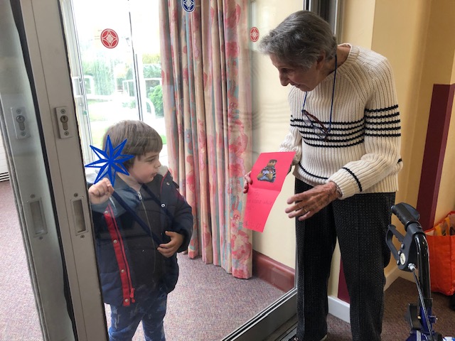 Fay Garcia with Alexander and a card he sent her during lockdown