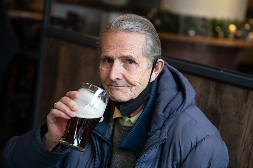 David Lloyd, 70, from South-East London, drinks a pint of beer in the Rockingham Arms pub