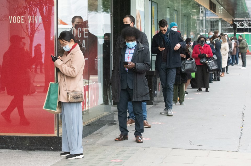 Long queues were seen outside Debenhams in central London this morning as the country emerged out of lockdown