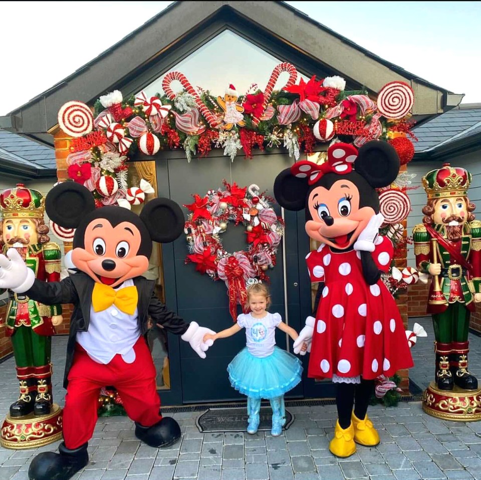 Their home has a candy cane theme with giant lollipops, sweets and baubles