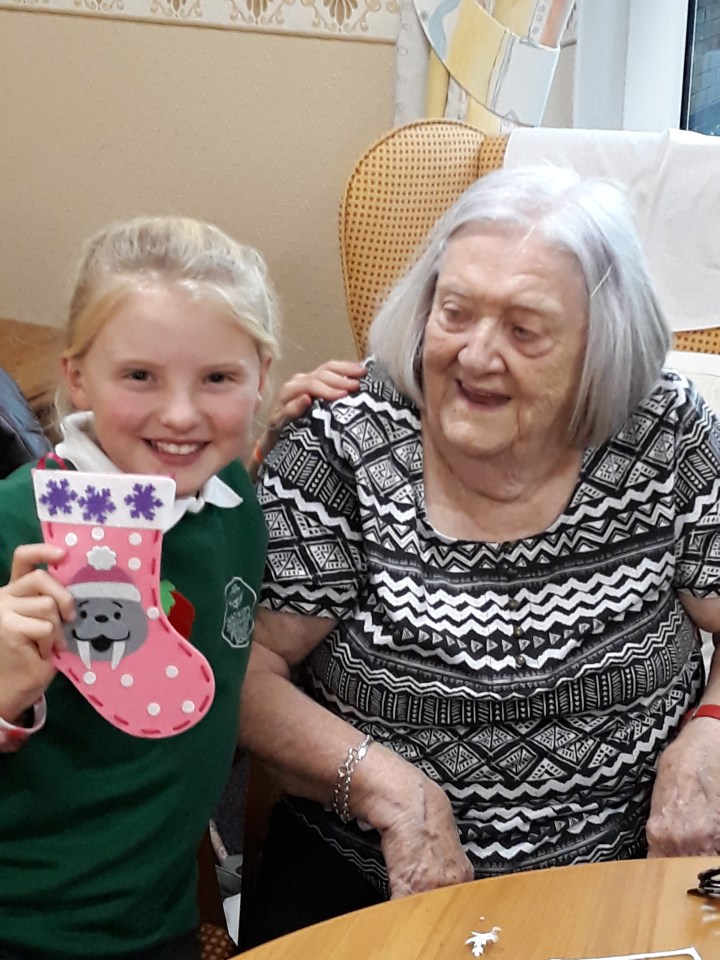 The pair with a Christmas stocking they made last year