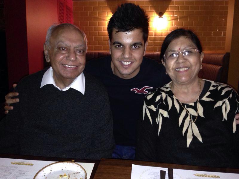 Dr Shukla, pictured with grandson Milan and wife Ranjan, said he is 'proud to do his duty'