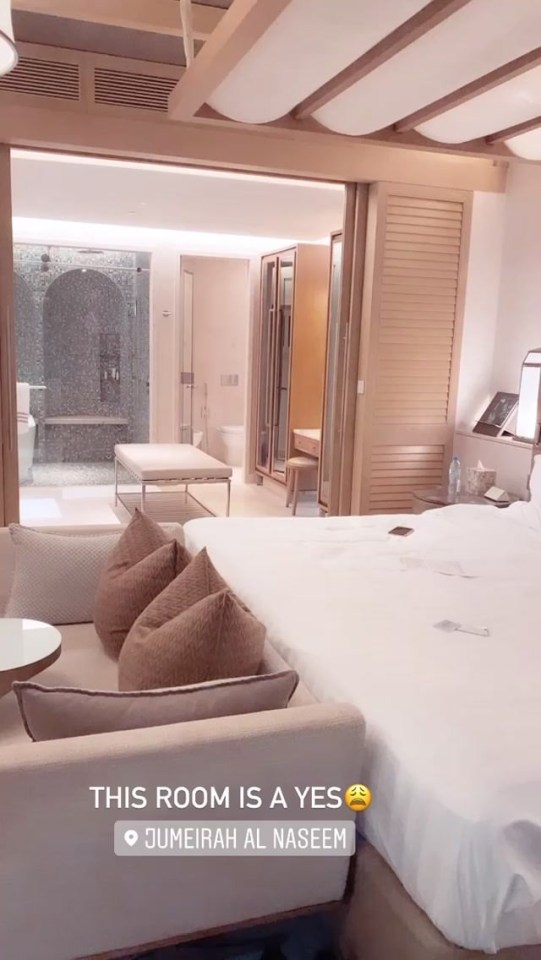 The couple's room boasted a huge white bed