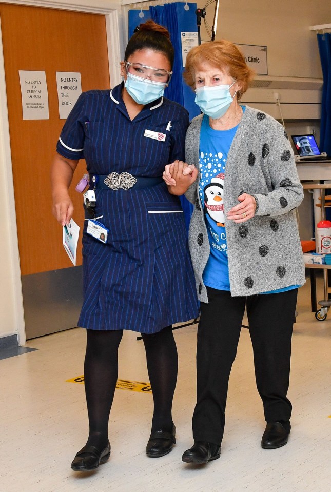 Maggie with nurse May Parsons who was the first NHS staff to administer the vaccine