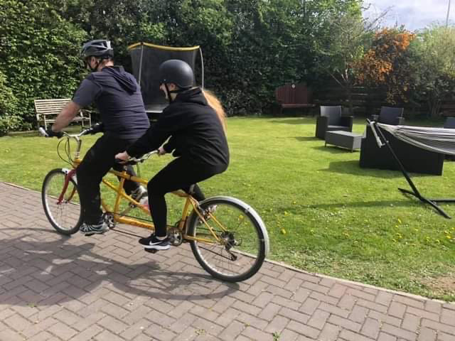 Sam goes on tandem rides with her dad and brother