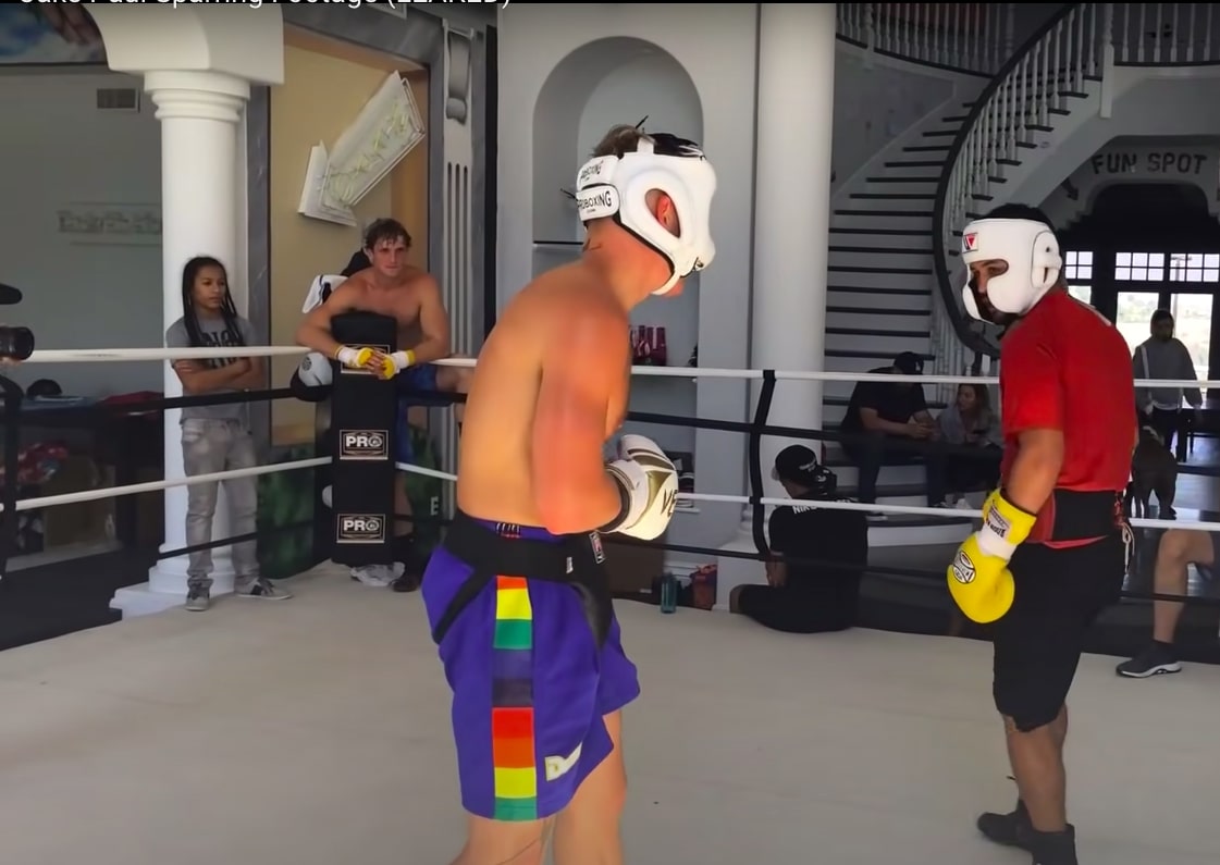 Paul sparring in the ring in his living room