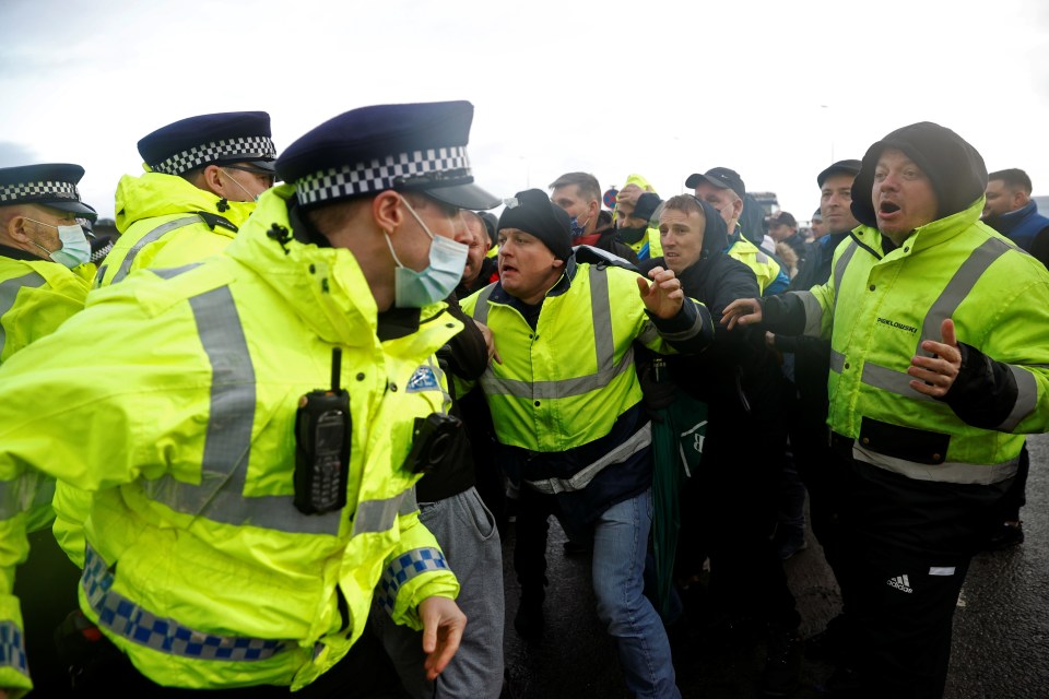 Tensions are high over the long delays as drivers face Christmas in their cabs