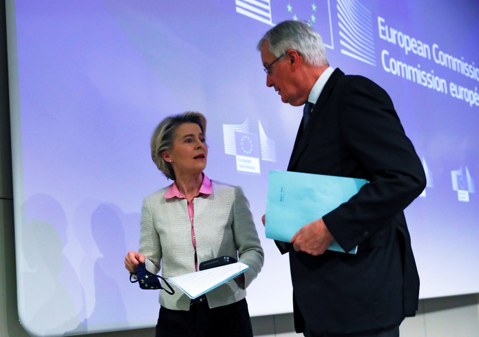 The EU's chief negotiator Michel Barnier speaks with European Commission President Ursula von der Leyen following their statements 