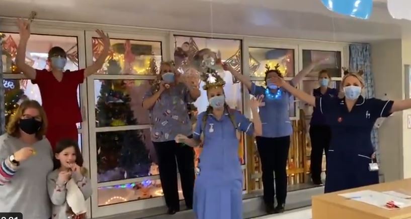 Dorset County Hospital staff ring their bells as part of a campaign against loneliness