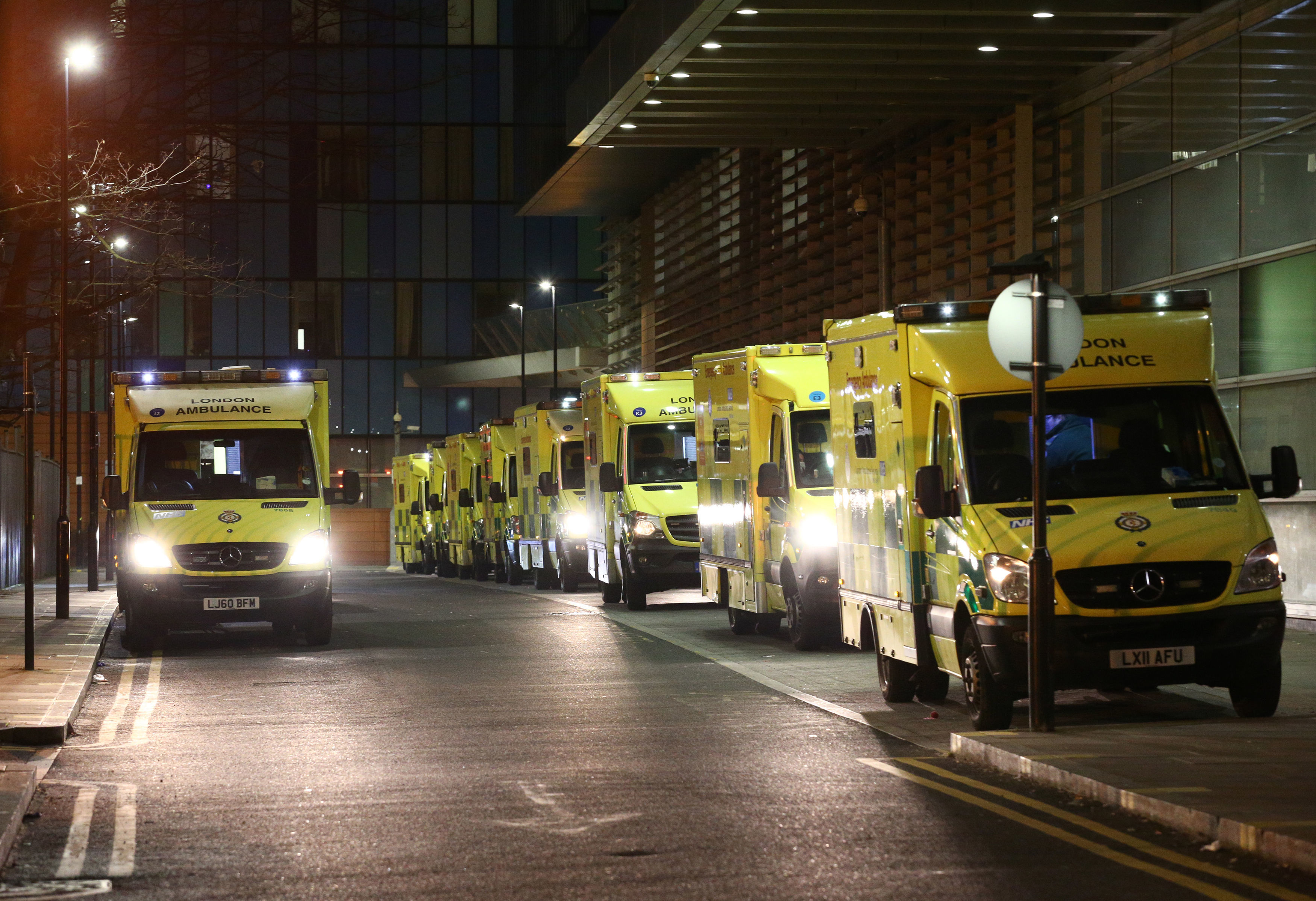 Ambulances wait outside the Royal London Hospital 