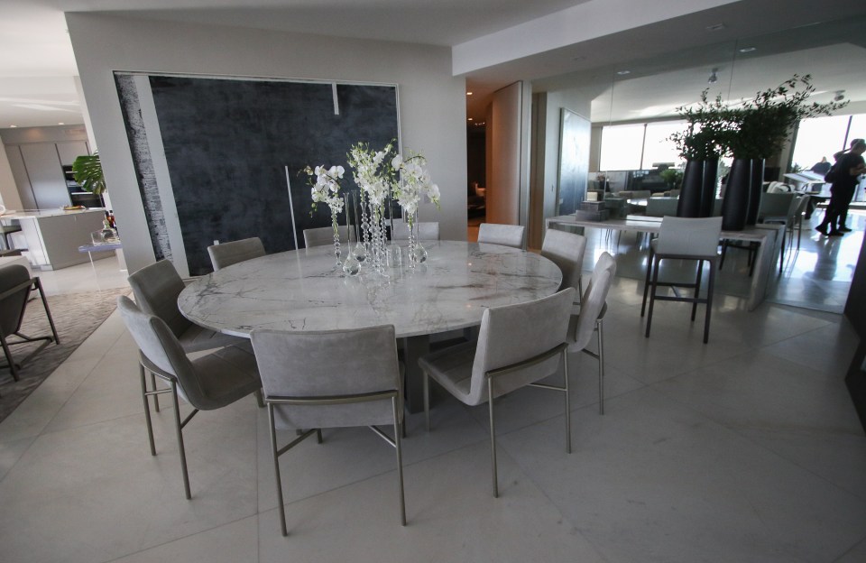 The showhome's dining room shows off the typical decor of the apartment block