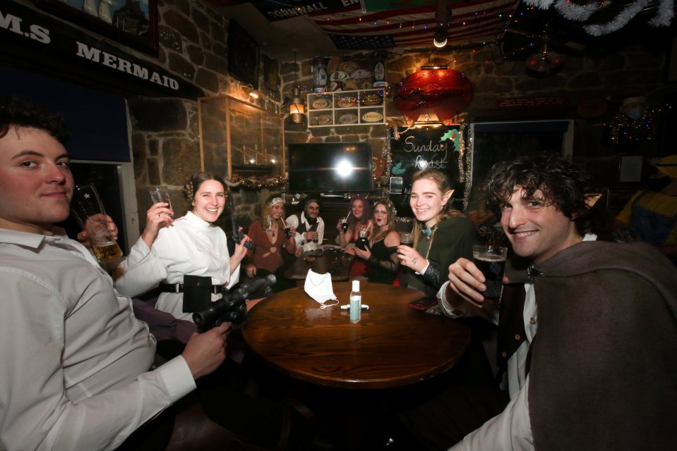 Lucky revellers in Britain’s only Tier 1 area - the Isle Of Scilly - toasted the New Year in pubs