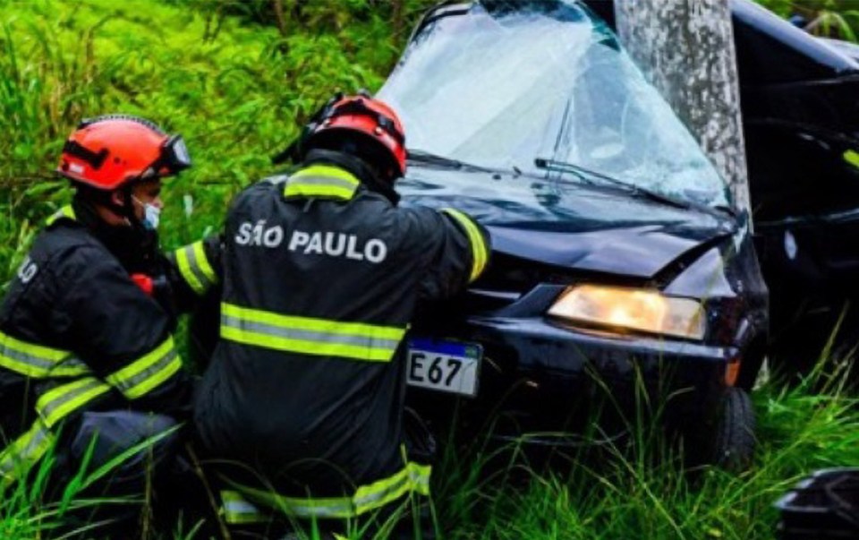 The boy's uncle wrapped his arms around him as the car hit a pole 