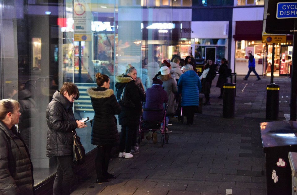 Brits lined the streets to get into shops as the lockdown ended this morning 