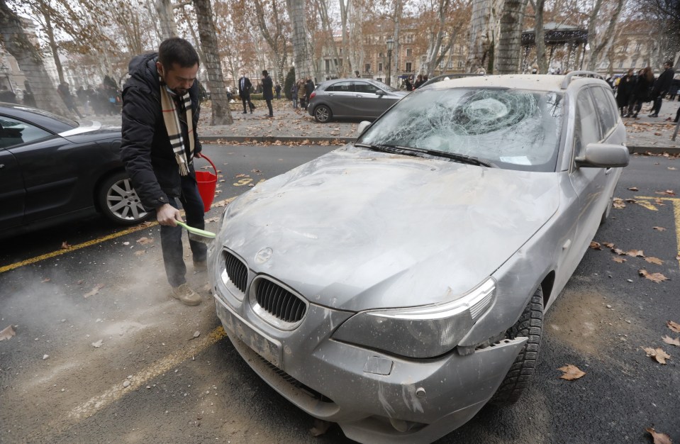 A damaged BMW in downtown Zagreb