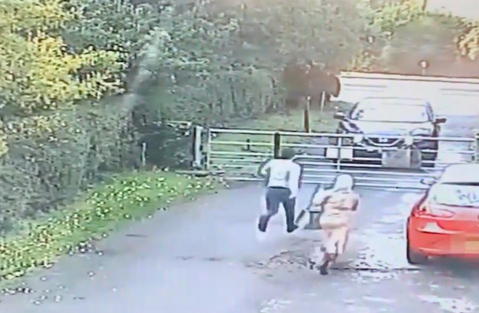 CCTV caught the couple leg it from the farm after they were chased by a dog