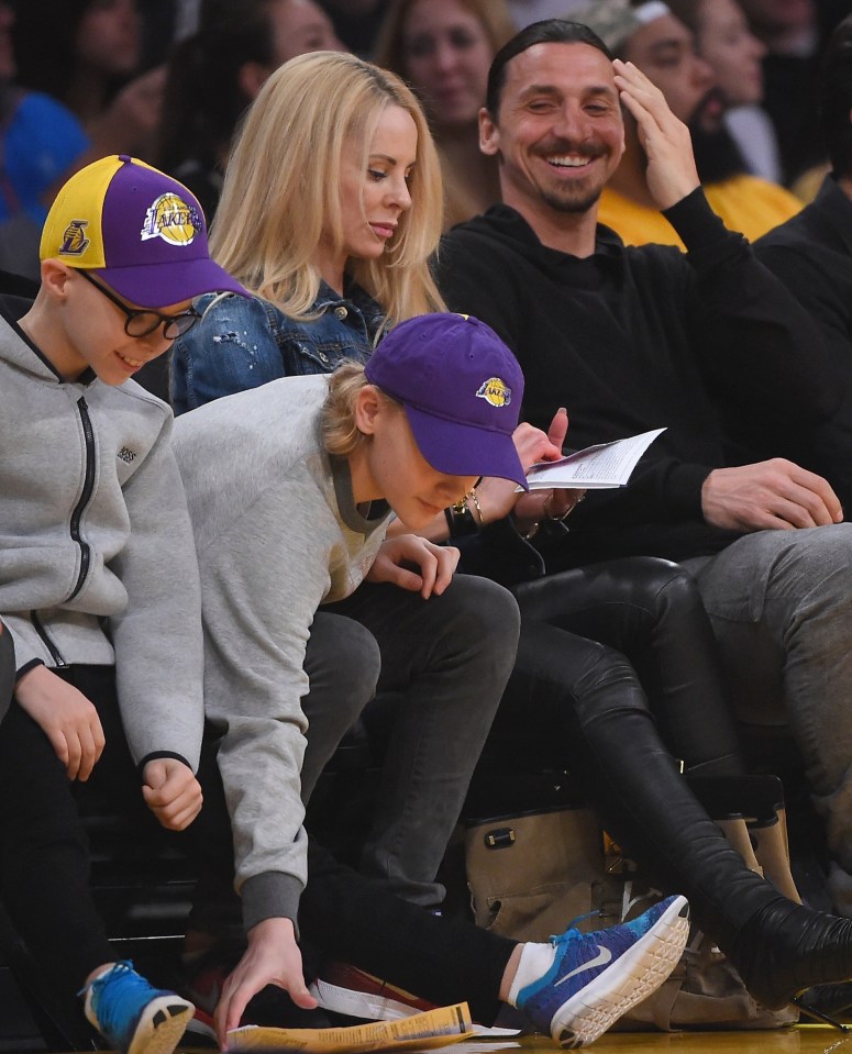 Ibrahimovic pictured with his wife Helena Seger at an LA Lakers NBA match in 2018