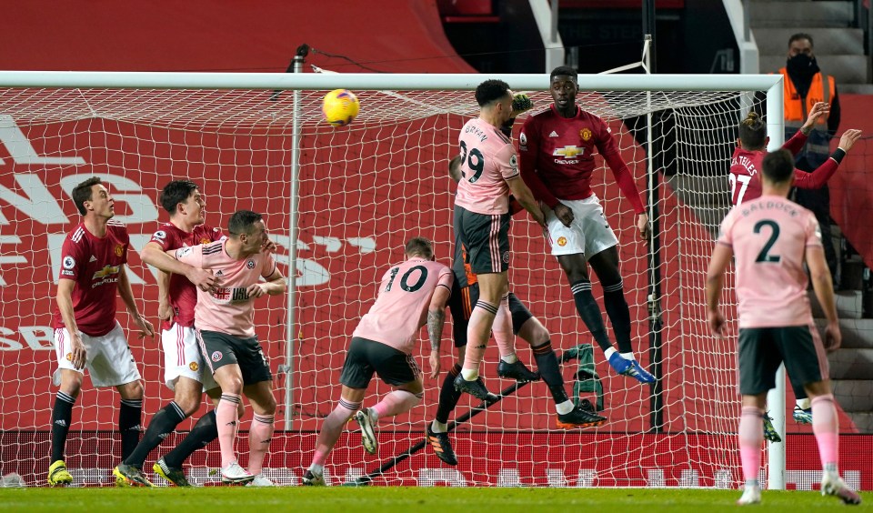 Kean Bryan rises to nod the Blades’ shock opener at Old Trafford