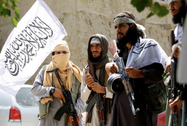 Taliban fighters in Afghanistan where the group is reportedly colluding with al-Qaeda forces 