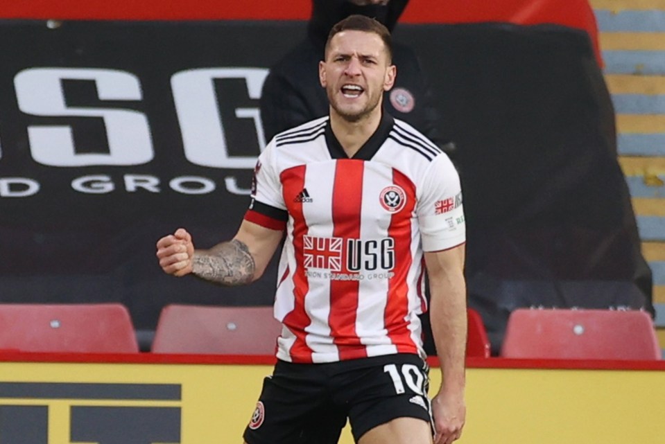 Scorer Billy Sharp celebrates as Sheffield United put their Premier League misery behind them in the FA Cup