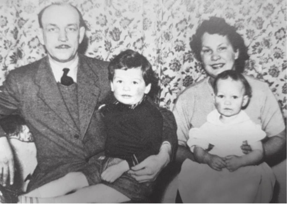 A young Mackay is pictured, second left, with dad Harold and their family