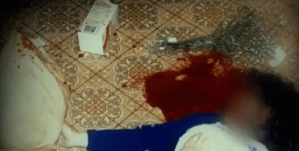 The blood-soaked crime scene after Dayle was shot in the head