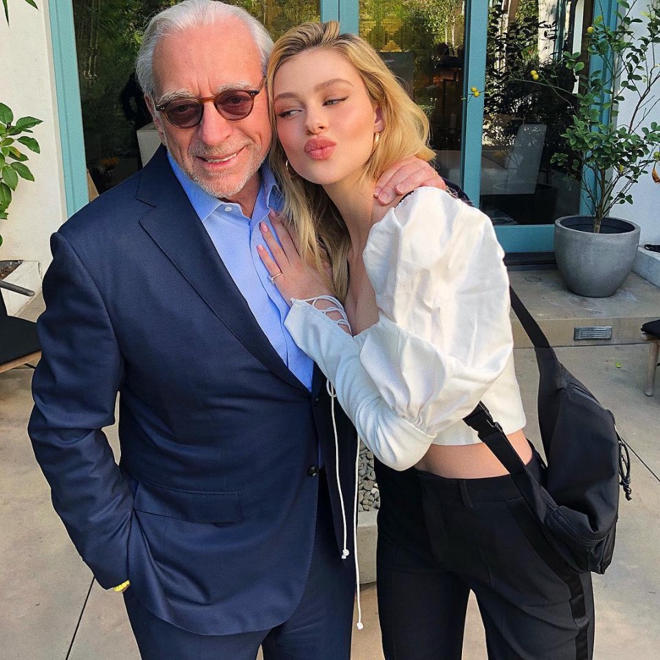 Brooklyn Beckham’s actress fiancée Nicola Peltz poses with her billionaire father, Nelson